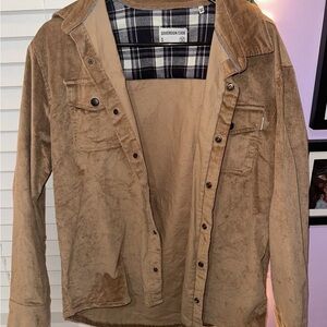 small men’s brown corduroy button up shirt